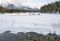 Distant Ice Skaters on Frozen Johnson Lake Royalty Free Stock Photo