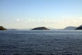 Distant Island on a Mountain Lake in Oregon Royalty Free Stock Photo