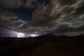 Summer monsoon storm in Southern Utah, USA with stars above breaking clouds Royalty Free Stock Photo