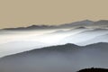 Distant mountain silhouette with soft light and clear sky