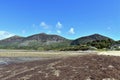 Distant mountains at the Welsh seaside. The beach at the small seaside village of Trefor on the Llyn Peninsula, north Wales. A