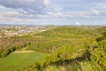 Distant Power Station in Green Landscape