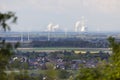 Distant Power Stations framed by trees