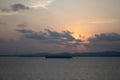 distant shilhoitte of ship with sunset sky horizon before dusk Royalty Free Stock Photo