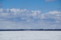 The distant shore of a frozen river Royalty Free Stock Photo