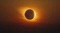 Distant solar eclipse through telephoto lens vibrant colors clear sky midday light