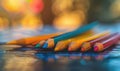 A distant view of colored pencils scattered on a tabletop Royalty Free Stock Photo