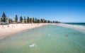 Distant view of Glenelg beach in Adelaide suburb on hot sunny summer day in SA Australia