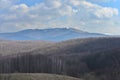 Distant view of the Godeanu peak, the sacred mountain of the Dacians, from the Vartoape plateau