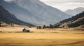 Distant view of a small house nestled between the mountains