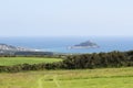 Distant view of St. Michaels Mount at high tide. Marazion, Cornwall, UK Royalty Free Stock Photo