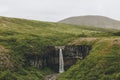 distant view of Svartifoss (Black fall) waterfall