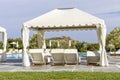 Distant view on Temple of Poseidon through pool