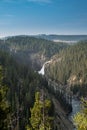 Distant view of Upper Falls waterfall in Grand Canyon of the Yellowstone National Park USA Royalty Free Stock Photo