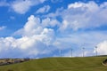 Distant wind-farm and cloudscape Royalty Free Stock Photo