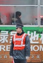 Distessed policeman on an ealry morning, Hefei, China