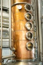 Distillate production process in copper distillation unit. Cpper vacuum still for distillation performed under reduced pressure Royalty Free Stock Photo