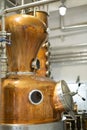 Distillate production process in copper distillation unit. Cpper vacuum still for distillation performed under reduced pressure Royalty Free Stock Photo