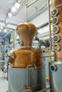 Distillate production process in copper distillation unit. Cpper vacuum still for distillation performed under reduced pressure Royalty Free Stock Photo