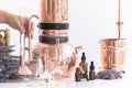 Distillation of lavender essential oil. Copper alambic in a Scandinavian interior. Chemical laboratory