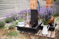 Distillation of lavender essential oil and hydrolate. Copper alambic for the flowering field.