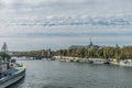 Distinct overview of the sunlight reflections over the Seine river, near the Alexander III bridge and the Grand Palais Royalty Free Stock Photo