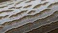 Distinctive texture with parallel, chevron-like grooves running across Royalty Free Stock Photo