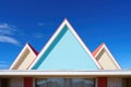 distinctive triangular roof under blue sky