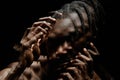 Distorted Portrait of Black Man Posing with Hands on Face in Contrast Light in Studio Royalty Free Stock Photo
