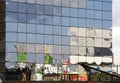 Distorted reflection of the building of stylized for Russian arc