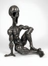 Metal sculpture of humanoid figure screaming with code imprints and hollow head symbolizing cognitive collapse under artificial Royalty Free Stock Photo