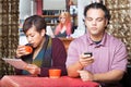 Distracted Couple Using Devices Royalty Free Stock Photo