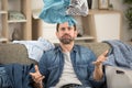 distraught man with lots laundry to do Royalty Free Stock Photo