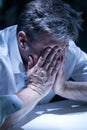 Distraught man in the office Royalty Free Stock Photo