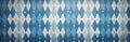 Distressed Bavarian grunge diamond pattern in blue, white. Vintage geometric illustration features rustic texture with festive, Royalty Free Stock Photo