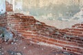 Distressed brick wall in the old destroyed abandoned building. Weathering and degradation Royalty Free Stock Photo
