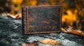 Distressed Brown Leather Wallet on Rustic Autumn Background Royalty Free Stock Photo