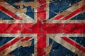 Distressed dark worn background of a vintage Union Jack national flag of the United Kingdom Royalty Free Stock Photo