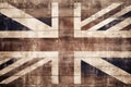 Distressed dark worn background of a vintage Union Jack national flag of the United Kingdom on wooden board panels