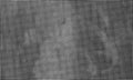 Distressed halftone grunge black and white scratches blurry shaded rough texture background. Royalty Free Stock Photo