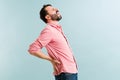Attractive man having a lot of back pain Royalty Free Stock Photo