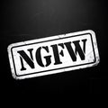 Distressed ngfw stamp on dark background Royalty Free Stock Photo
