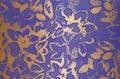 Distressed overlay texture of golden blue violet fabric. Textile with eastern floral ornament, leaves and flowers. grunge Royalty Free Stock Photo