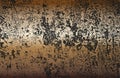 Distressed overlay texture of rusted peeled golden metal plate. grunge background