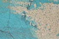 Distressed painted wall, cyan graffiti paint on rough concrete cracked wall. Background. Royalty Free Stock Photo