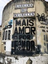 Distressed poster and graffiti in Laderia Do Meireless, Rio de Janeiro, Brazil