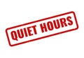 Distressed red rubber stamp effect indicating Quiet Hours text for designated peaceful and silent periods Royalty Free Stock Photo