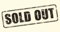 distressed sold out stamp on off-white background Royalty Free Stock Photo