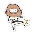 distressed sticker of a cartoon bald man karate kicking Royalty Free Stock Photo