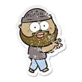 distressed sticker of a cartoon bearded man grasping